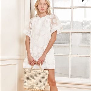 Lu Lu’s white jacquard dress